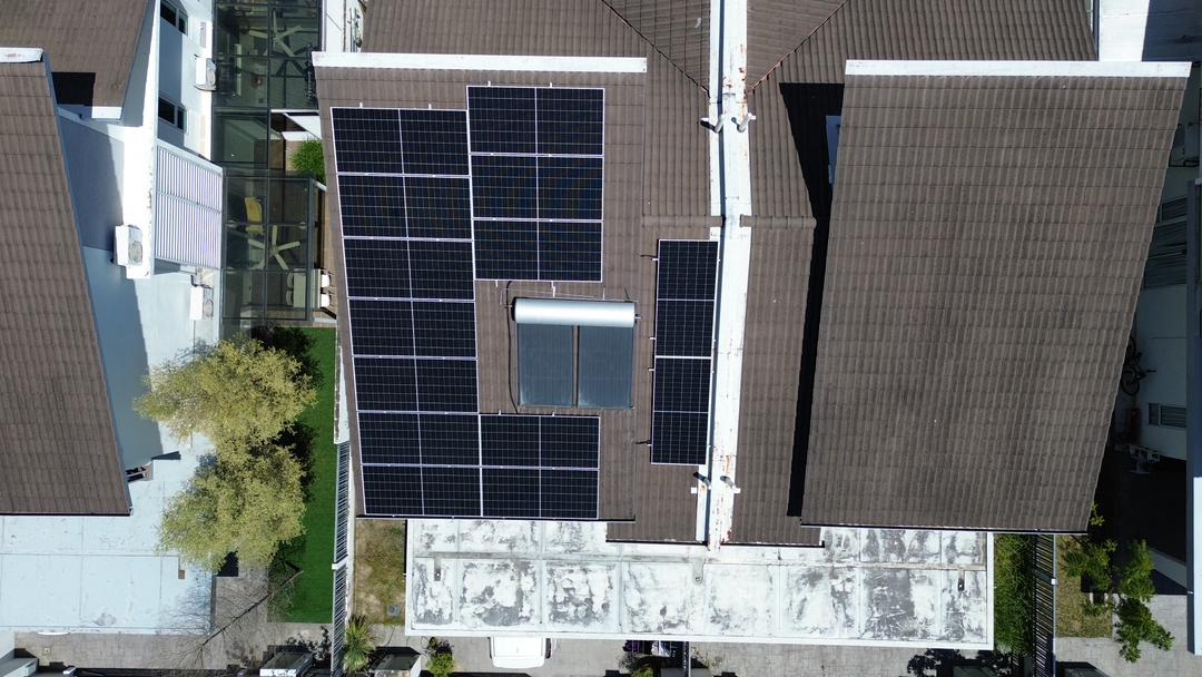 Custom solar panel layout fitted around a complex residential roof